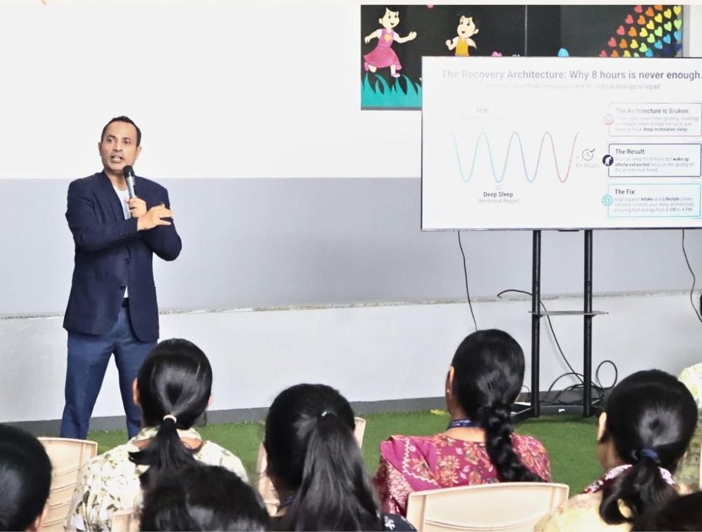 Rrishi Barman presenting a session on sleep and recovery